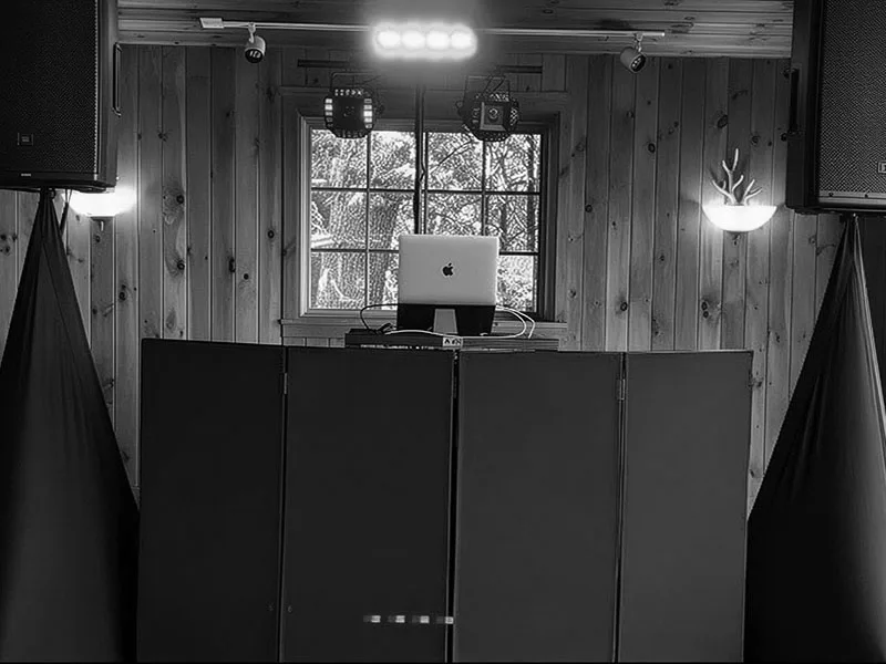 Compact MX Productions DJ and sound setup at a wedding venue