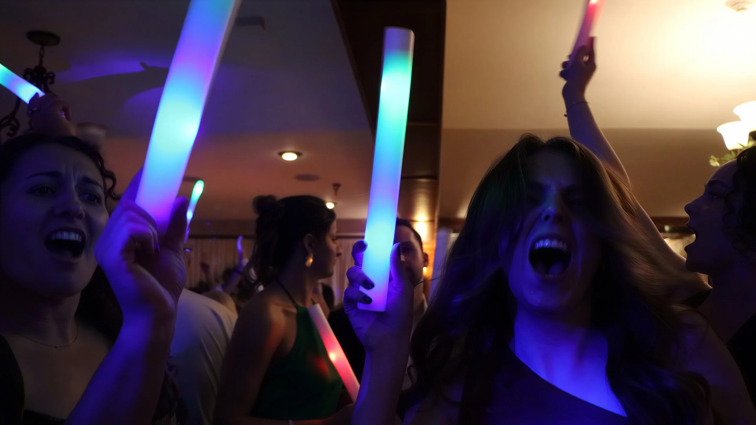 Women dancing and screaming at Adirondack Wedding